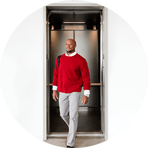 man exiting an elevator