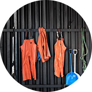 work clothes shovels in garage