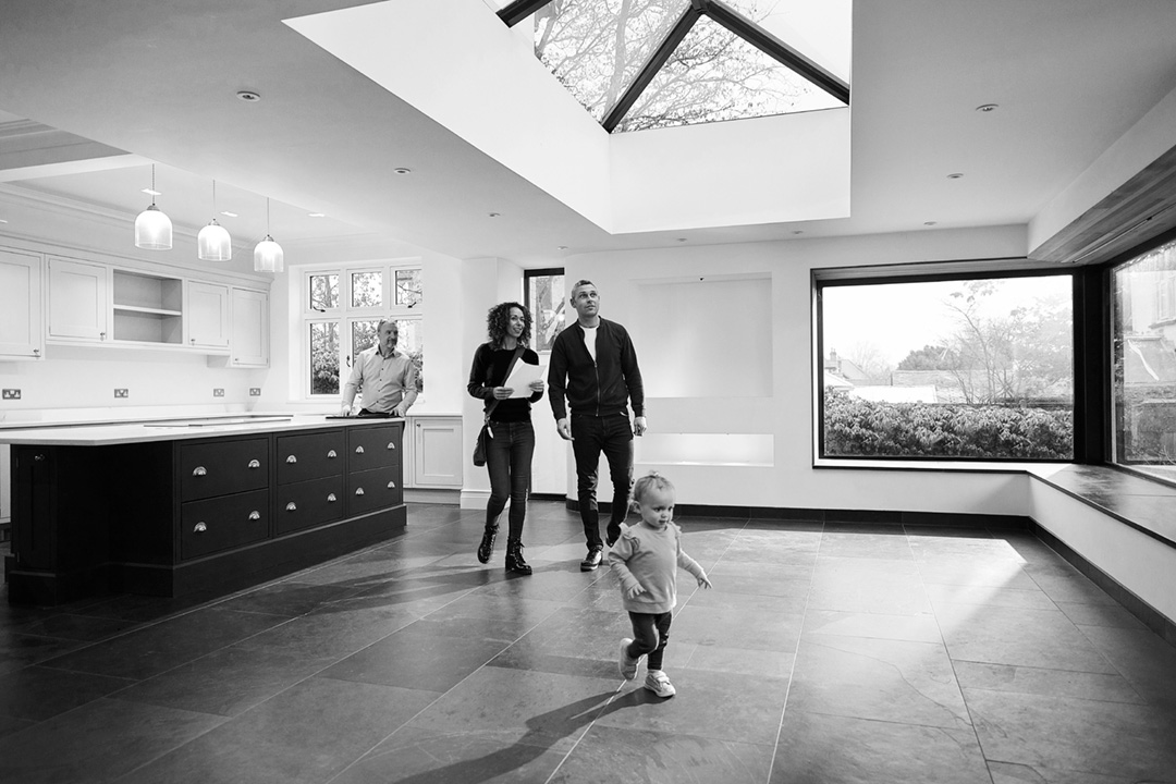 Family in kitchen with baby